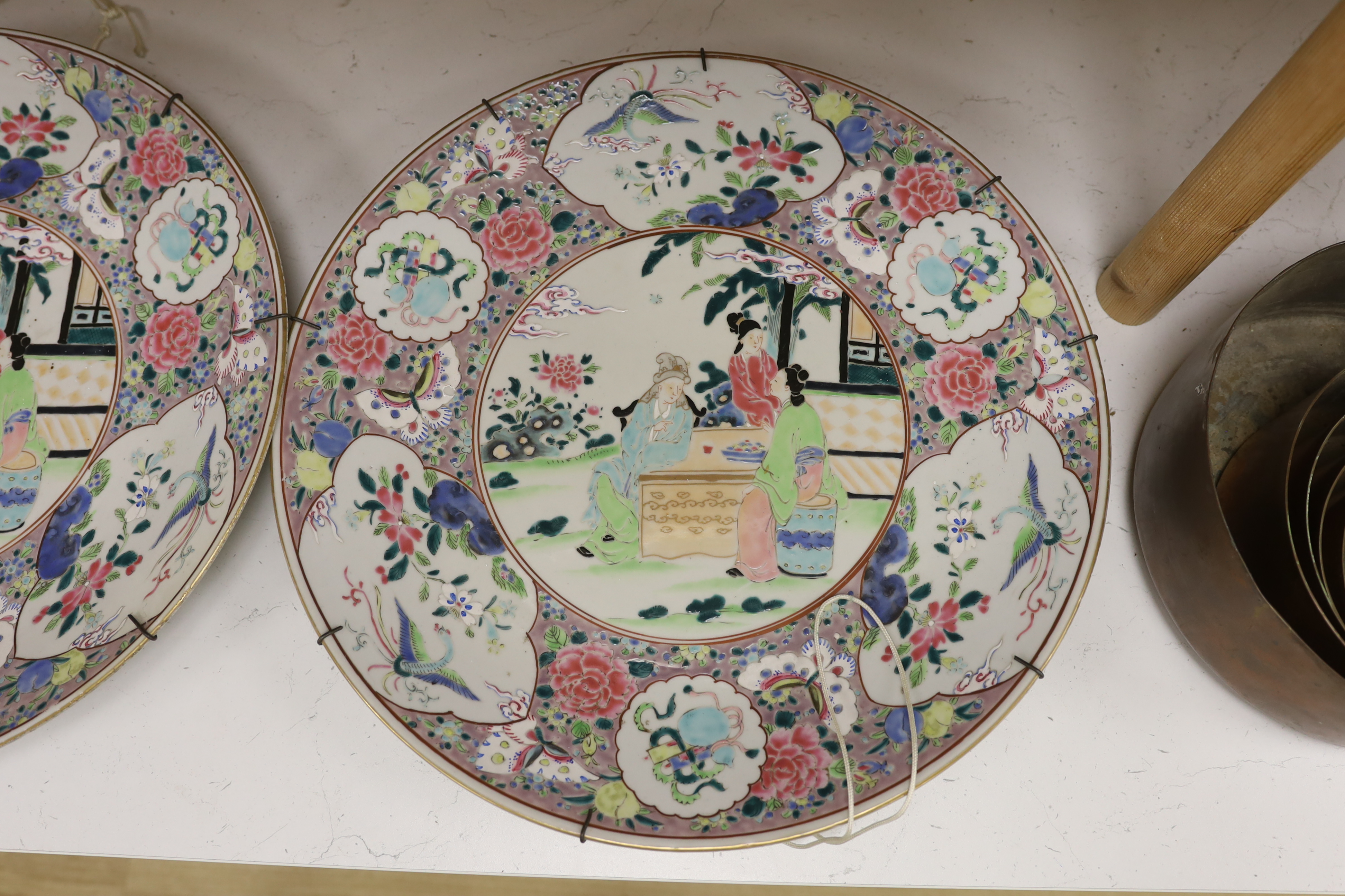 A pair of early 20th century Japanese porcelain chargers, 46cm diameter. Condition - good